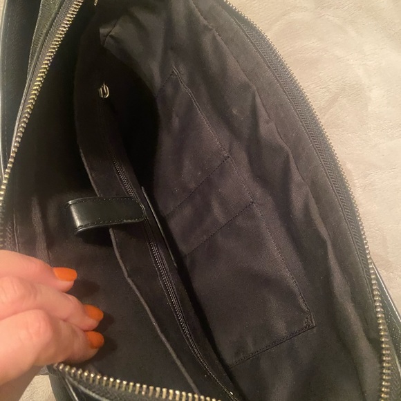 Coach briefcase. Posed w/purse pillow to demonstrate shape. Used once. No marks. - Picture 7 of 7